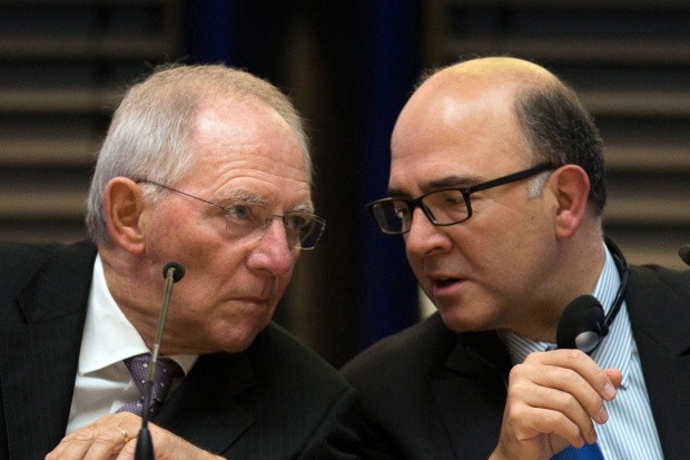 Франция и Германия с двойна решителност Гърция да запази еврото