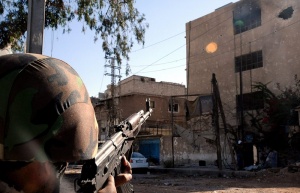 Сражения между армия и опозиция в два квартала на Дамаск