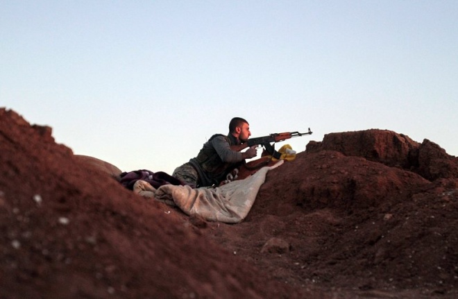 Сражения между кюрдски бойци и джихадисти в северна Сирия