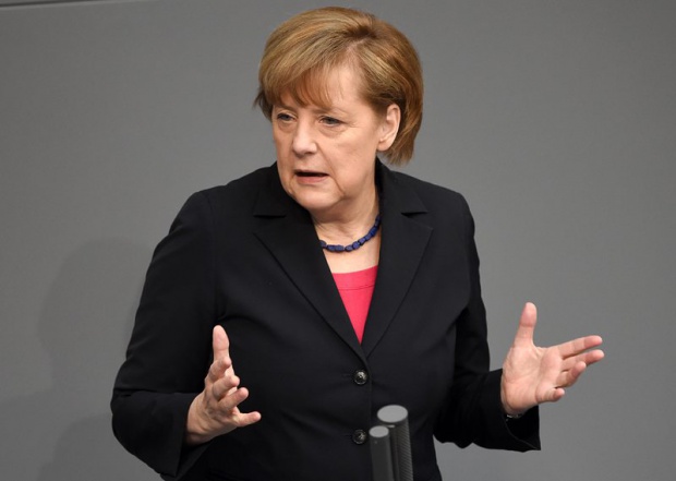 Меркел призова Путин да спазва сделката от Женева
