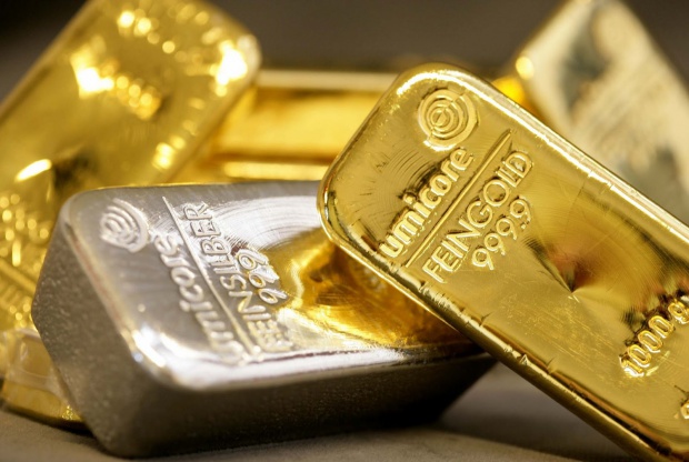 Златото остава с по-ниска цена, въпреки изгледите за възход на икономиката