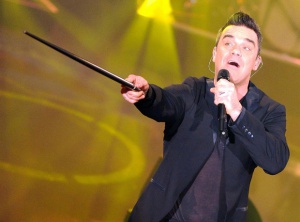 Роби Уилямс отива в Русия като шейх