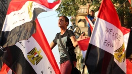Привърженик на новоизбрания президент на Египет – Мохамед Мурси от Мюсюлманското братство, по време на демонстрация в Кайро.