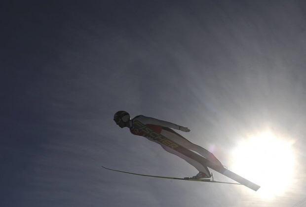 Грегор Шлайрензауер от Австрия тренира ски скокове за Зимните олимпийски игри в Сочи, Русия