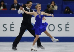 Кейтлин Уийвър и Анрдю Пойе от Канада изпълняват своето съчетание с кънки на лед на Световен шампионат по фигурно пързаляне в Саитама, Япония